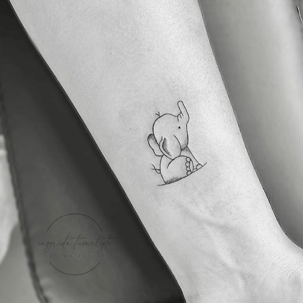 cute tiny elephant tattoo