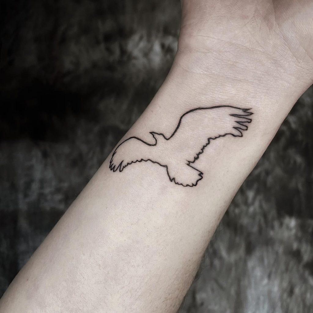 black and white bird tattoo