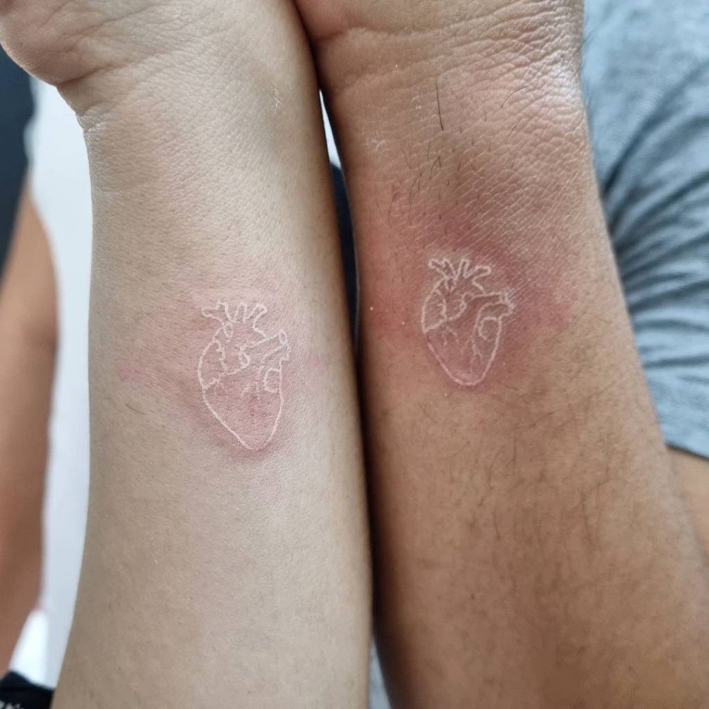 Matching White Anatomical Heart Tattoo