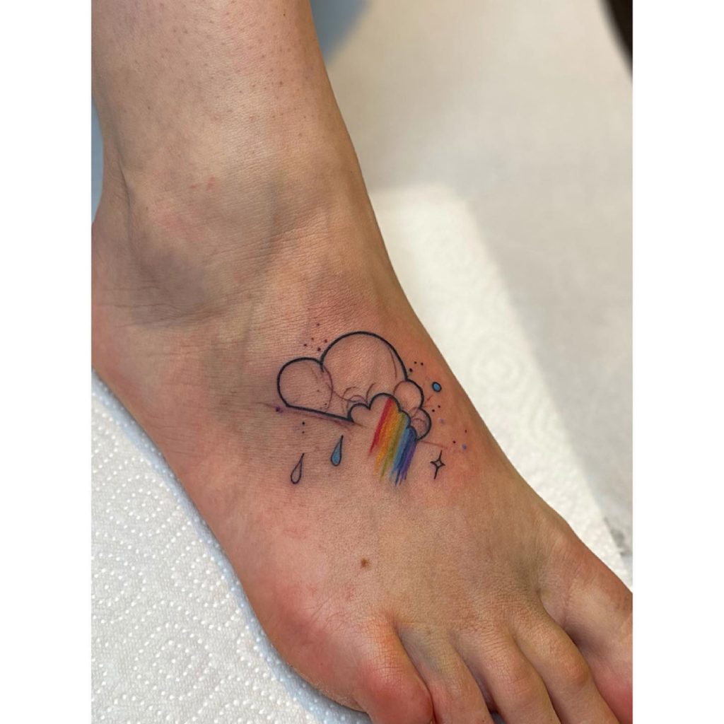 rainbow tattoo on the foot