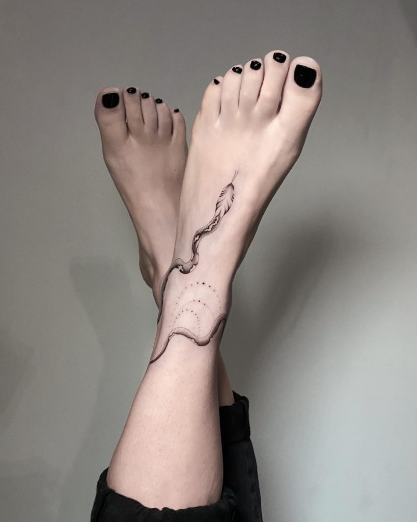 snake tattoo on the foot
