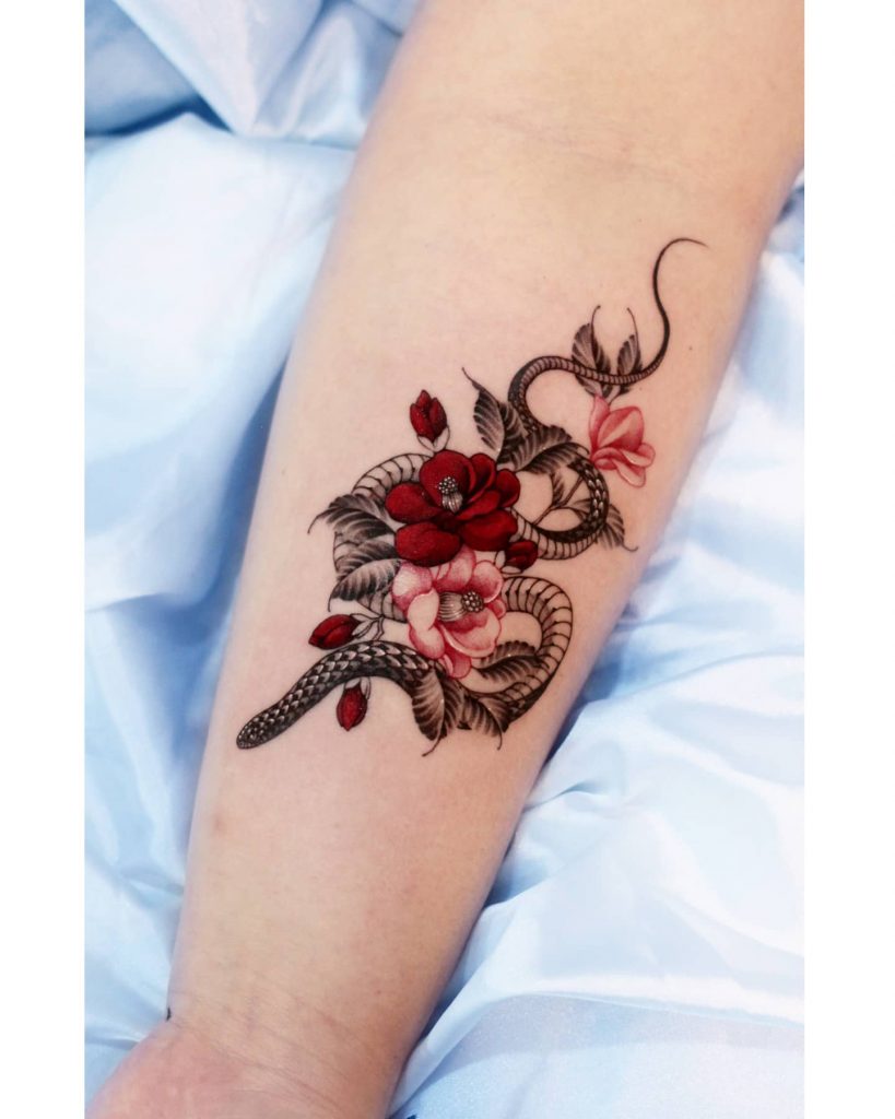 colorful flower and snake tattoo