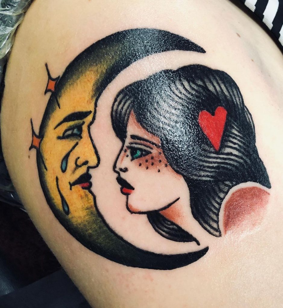 A girls in love with the moon tattoo