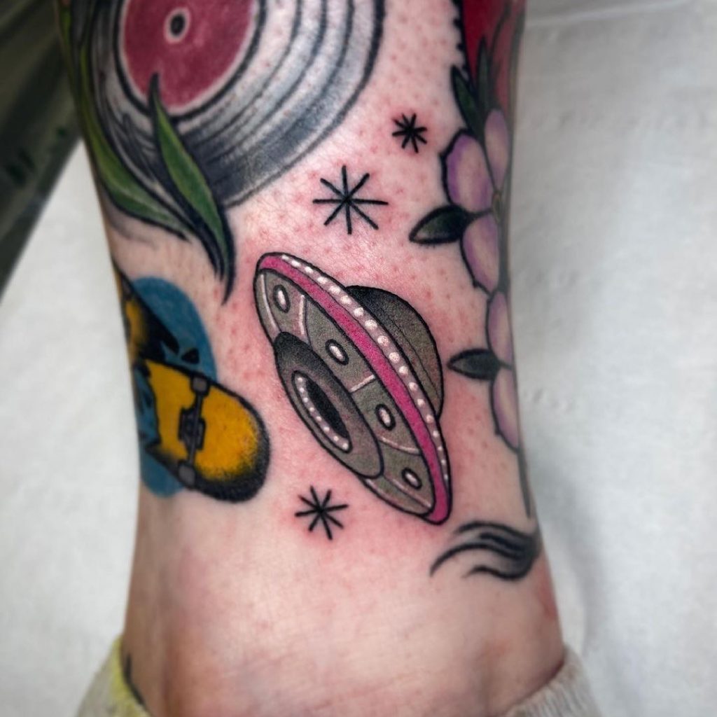 A UFO small gap filler tattoo