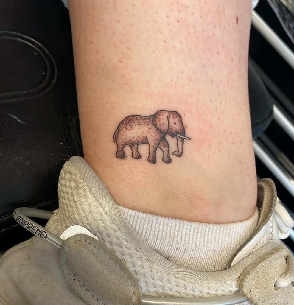 A small leg tattoos depicting an elephant