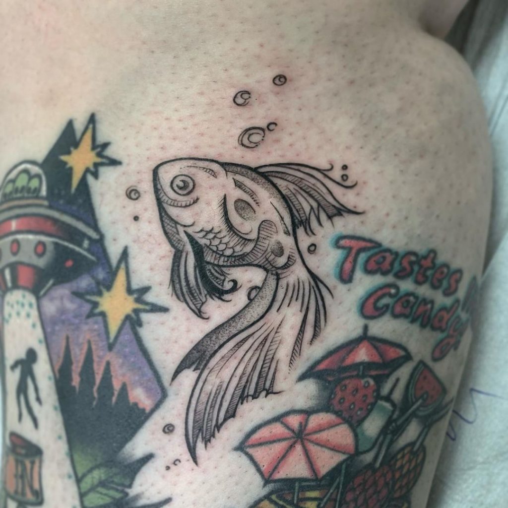 A fish small filler tattoo