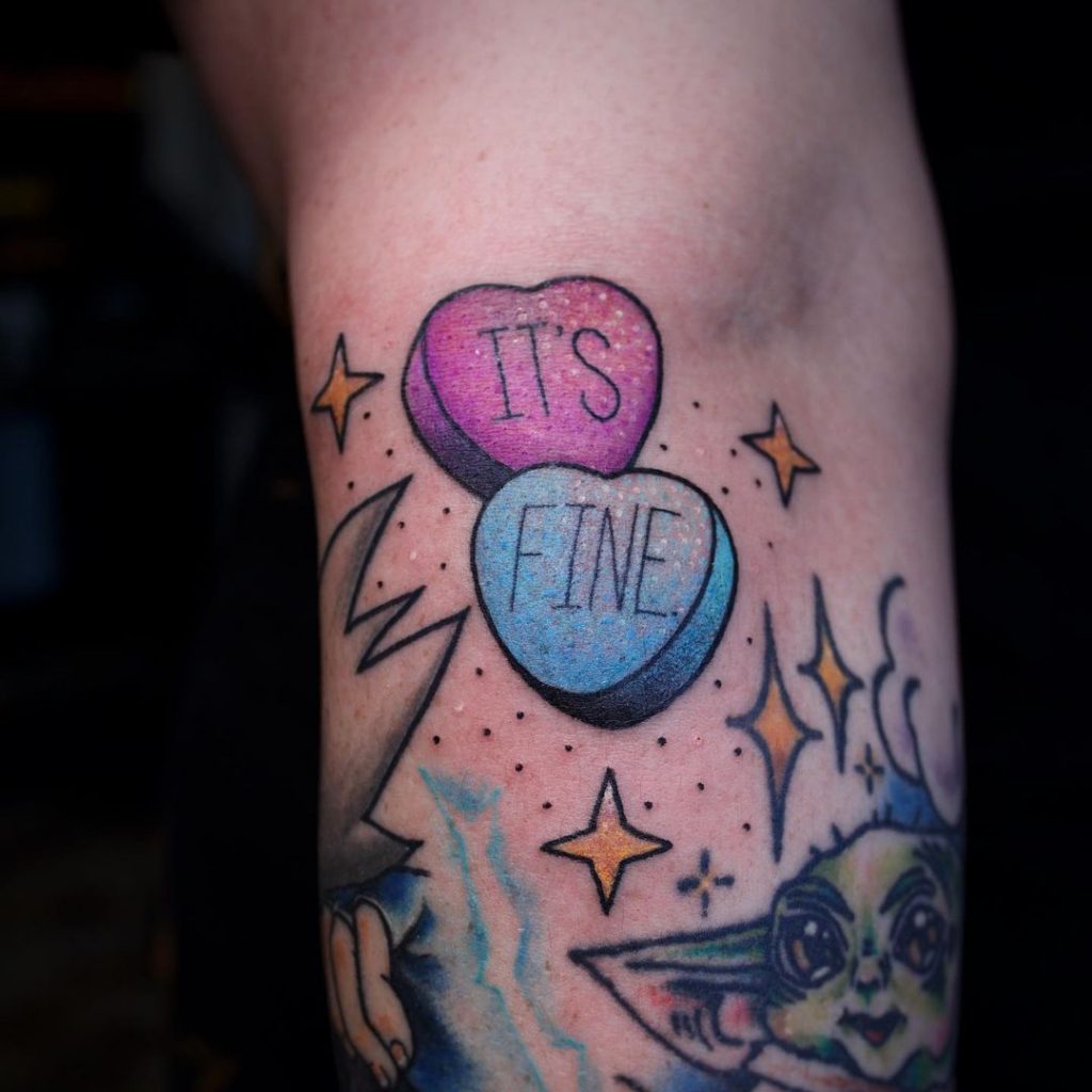 An It's Fine small filler gap tattoo