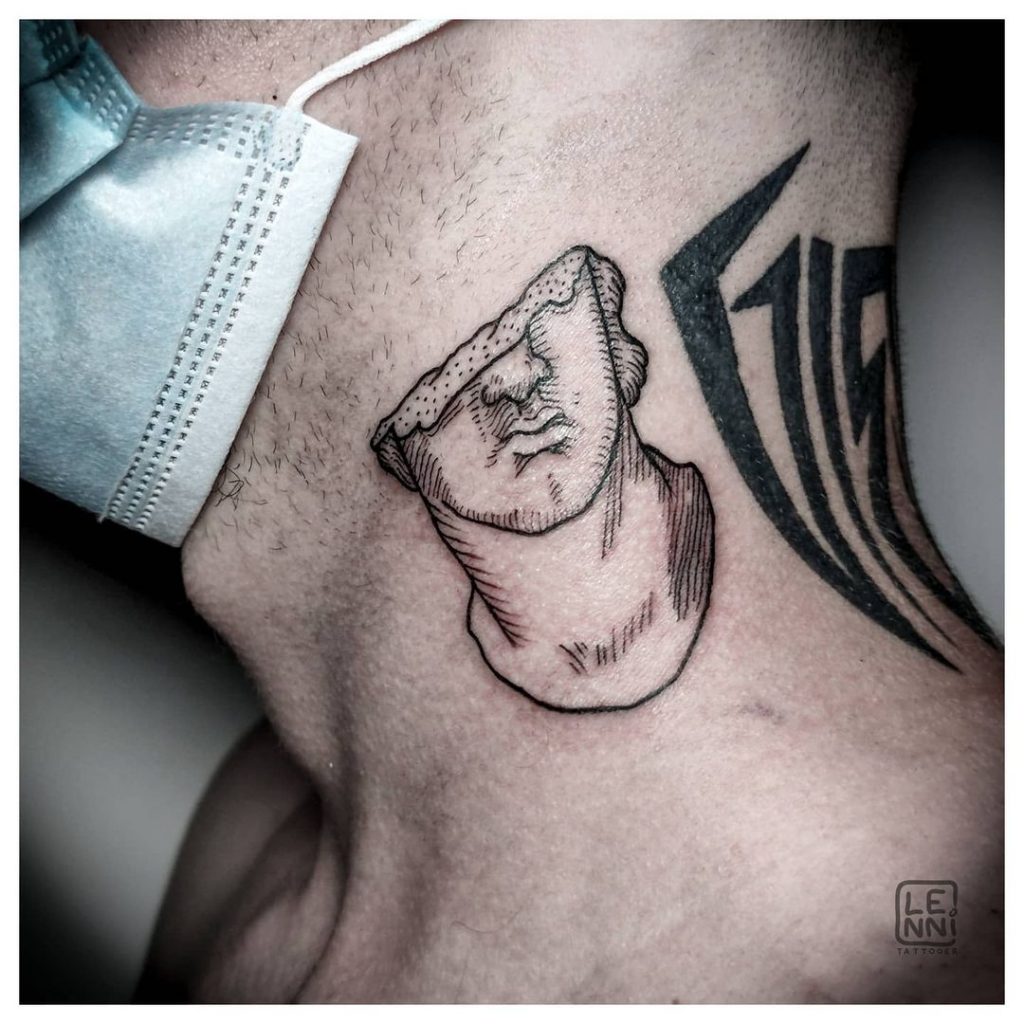 Greek statue tattoo