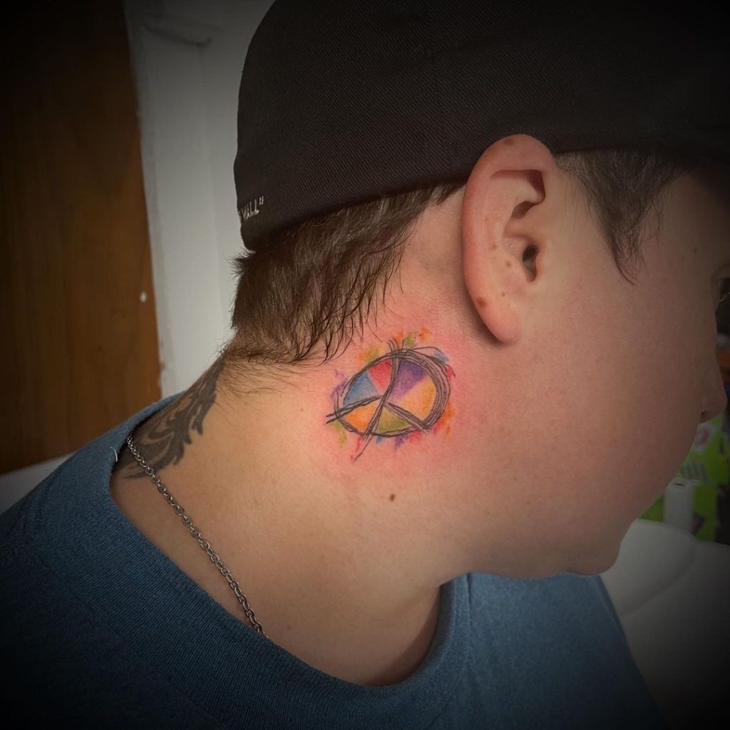 Peace symbol tattoo