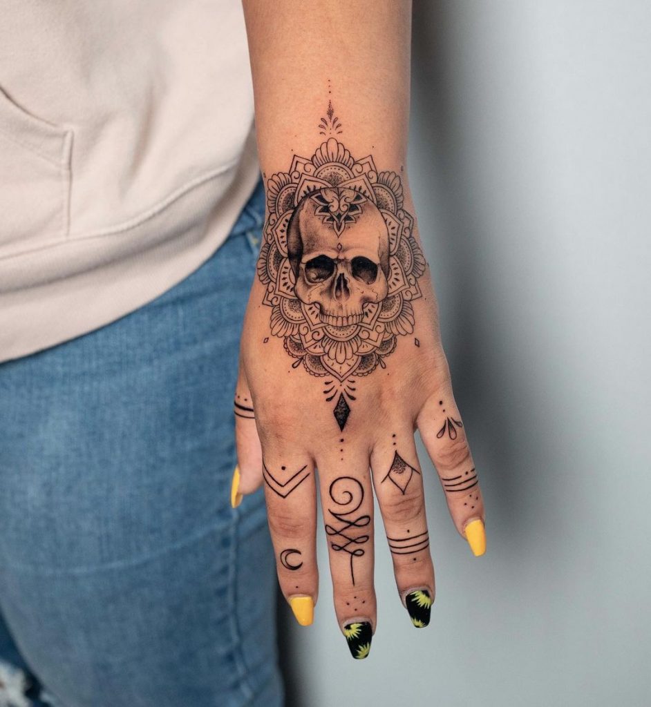 A henna small skull tattoo idea