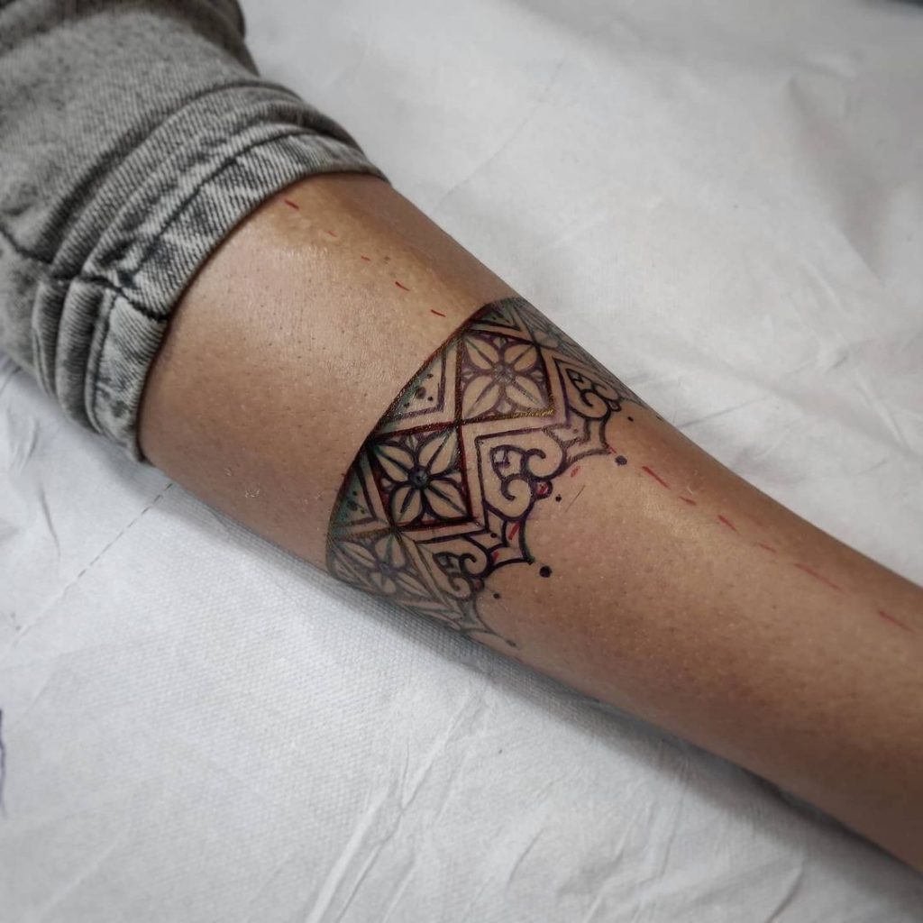 An ankle bracelet small leg tattoo