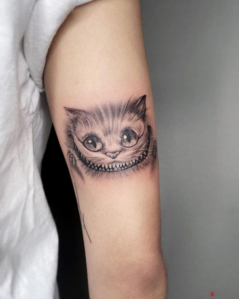 Adorable Cheshire cat tattoo