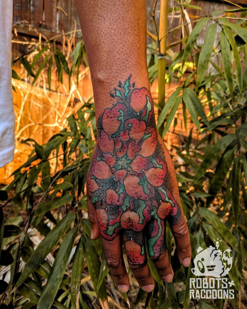 Fruit color tattoos on dark skin