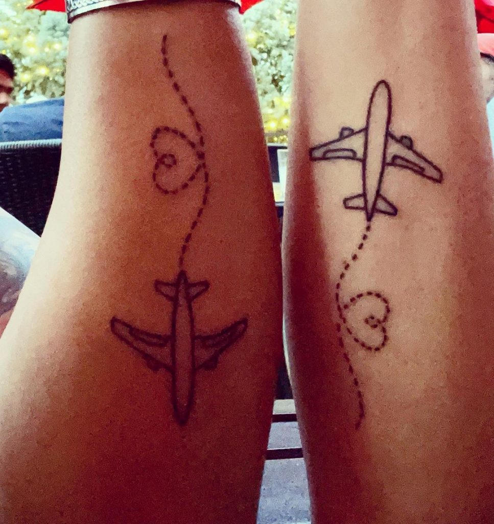 Airplanes as small friendship tattoos.