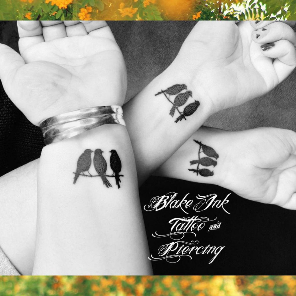 Birds as small friendship tattoos.