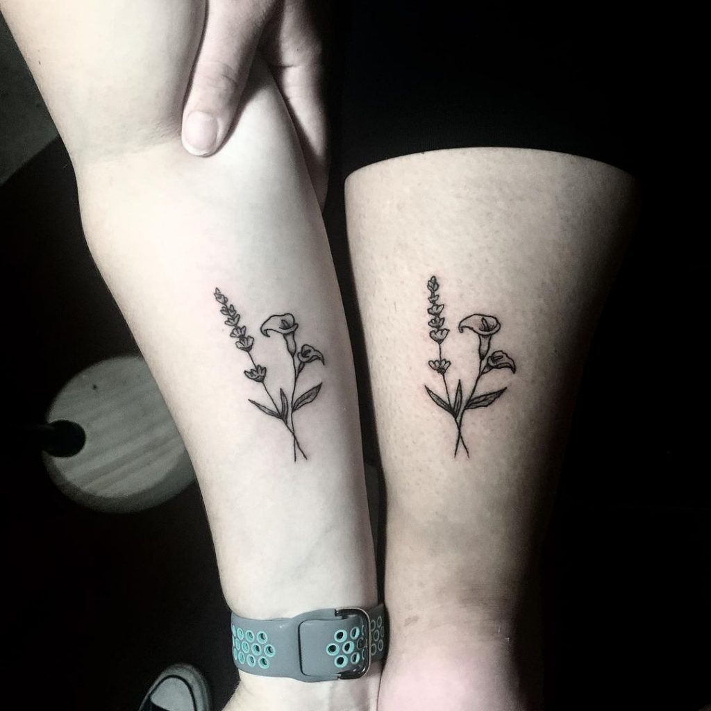 Flowers as small friendship tattoos.