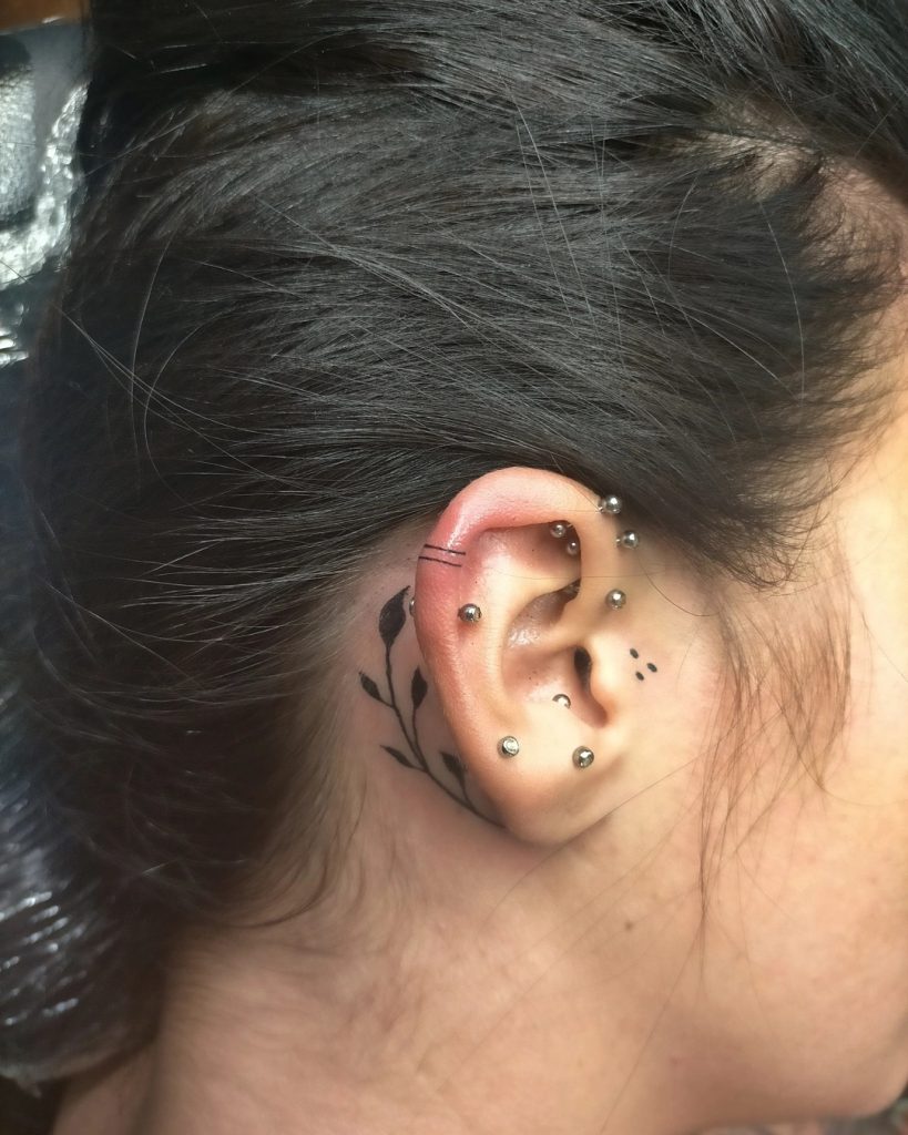 Ivies as behind the ear tattoos