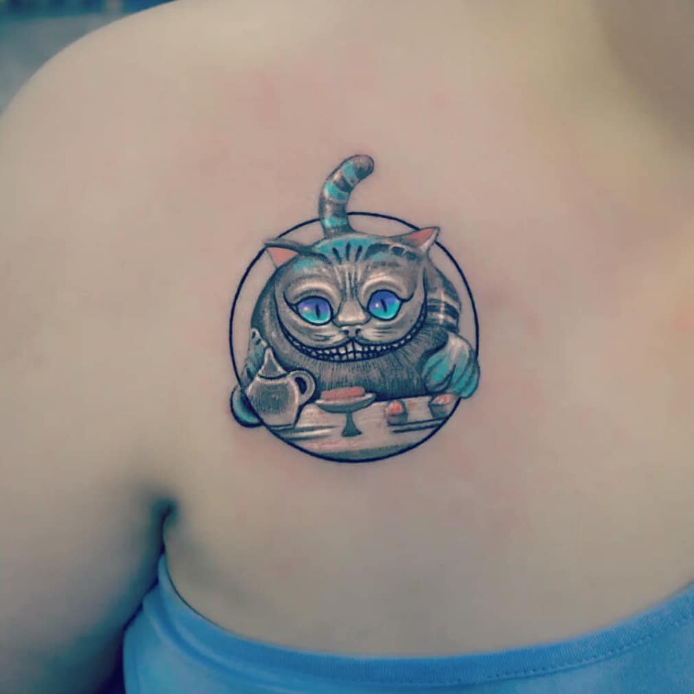 Small Cheshire cat tattoo