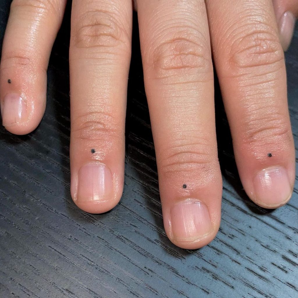 Dots small finger tattoos