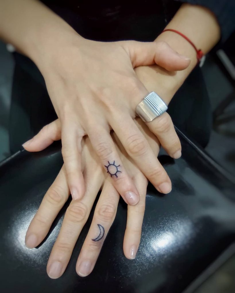 Moon and sun small finger tattoos