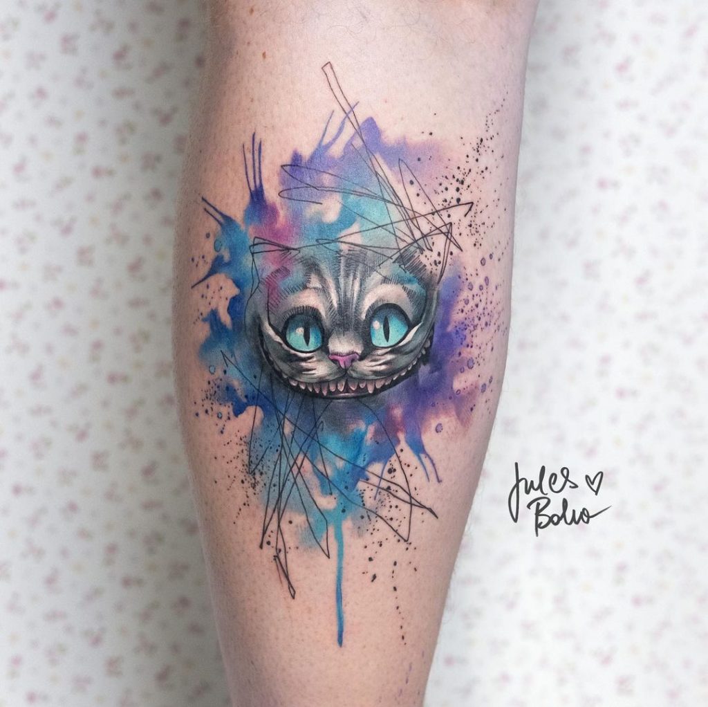 Cheshire cat tattoos with blue tint