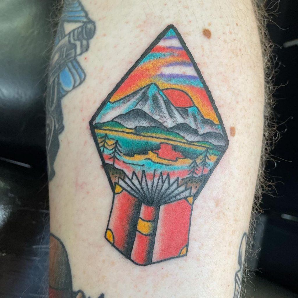 Book with a landscape tattoo
